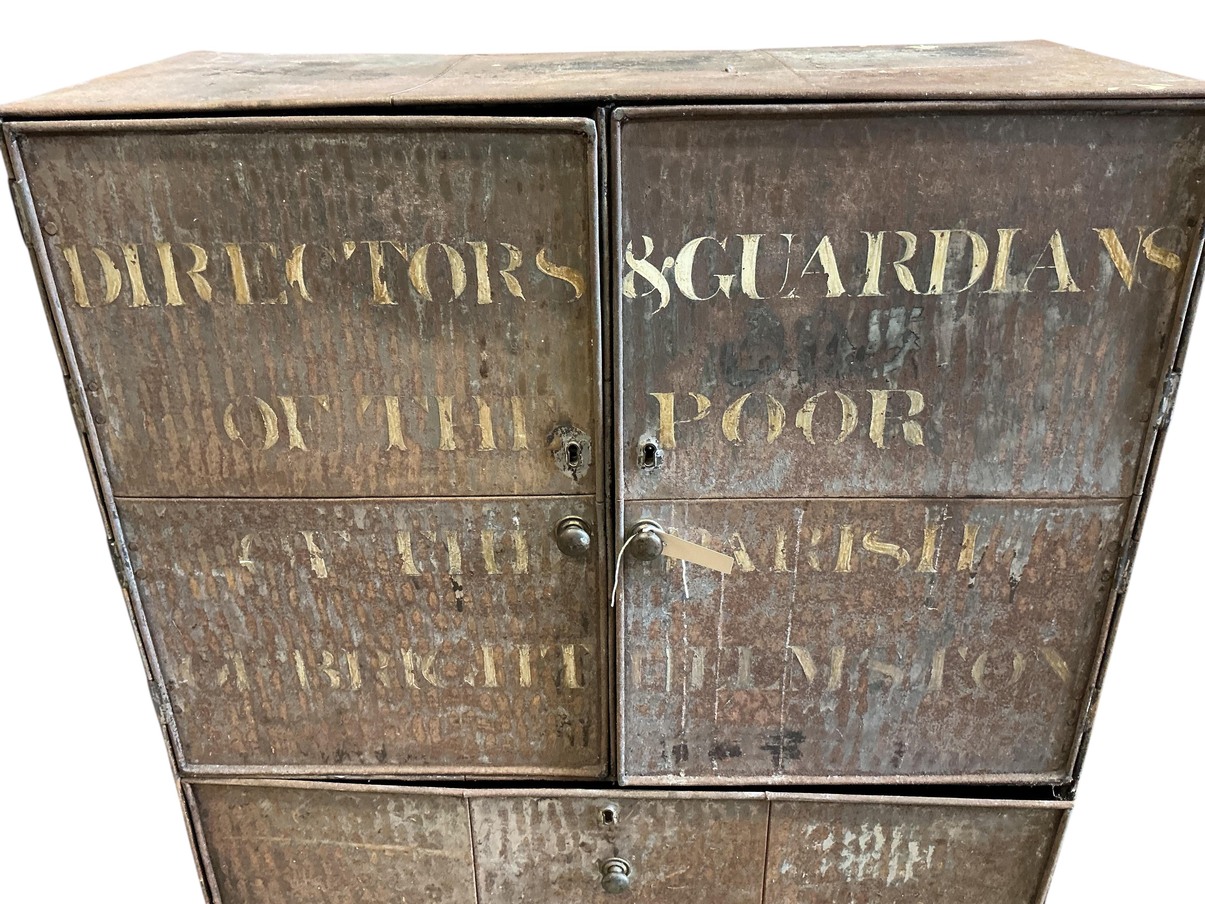 An early 19th century metal Alms chest with traces of original paint, the front with original stencilled legend 